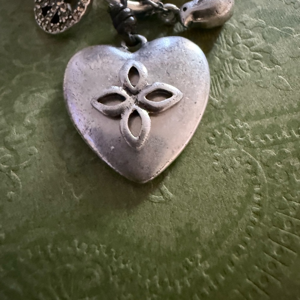 Silver Heart Pendant with Floral Design